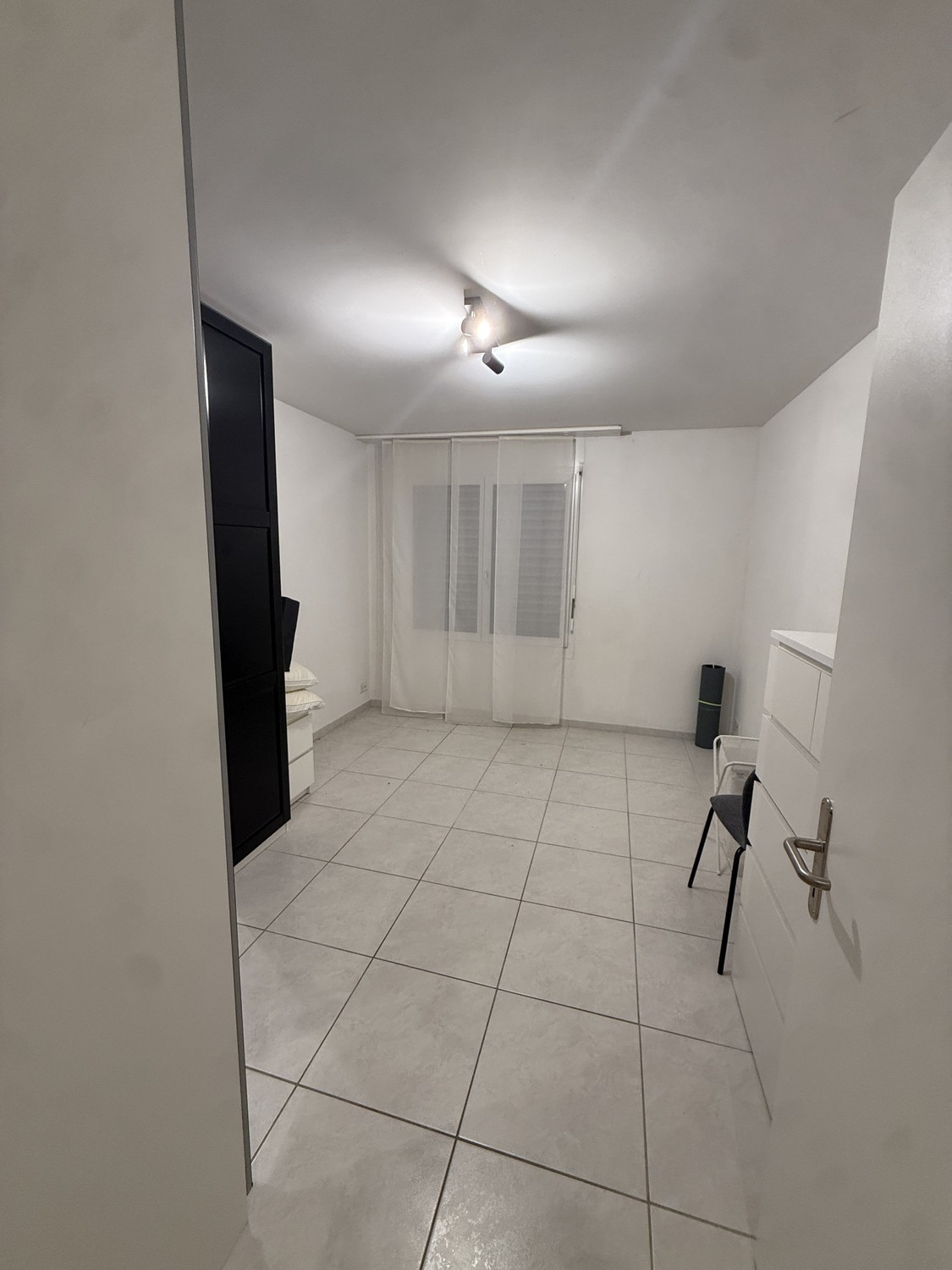 Camera in un appartamento condiviso